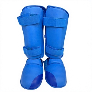 Espinilleras de Karate Ligeras de Cuero PU Aprobadas por la WKF - Equipo de Entrenamiento de Artes Marciales Duradero y Cómodo - Product Image 1