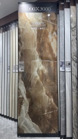 Revêtement de sol élégant et luxueux en pierre frittée imperméable à texture pierreuse 1000*3000mm pour chambre, bureau, piscine et usage extérieur