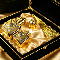 Flacon de parfum de luxe doré ajouré en verre avec bille roll-on 7ml 10ml pour huile essentielle Oud Attar arabe avec capuchon à pompon