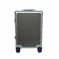 Valise à roulettes rigide ultra-légère en alliage de titane et d'aluminium de qualité OEM pour les acheteurs de marques de luxe