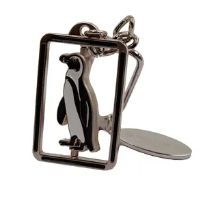 Nouveau design en alliage de zinc rotatif Mini porte-clés en forme de pingouin animaux personnalisés porte-clés pour cadeau promotionnel