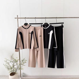Completo in Maglia a Maniche Lunghe Autunno Inverno per Commercio Estero, Set <span class=keywords><strong>Donna</strong></span> con Maglione a Contrasto con Zip e Pantaloni a Gamba Larga - Product Image 1