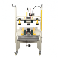 Scelleuse de cartons FXJ-6050 à entraînement par le haut et le bas, machine à sceller les cartons, scelleuse de boîtes, prix de gros direct usine