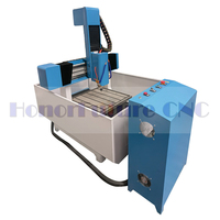 Jinan HonorFuture 3-Axis 4040 CNC Router Fresadora Moldes de un solo husillo con sistema de control Mach3 NC Studio DSP