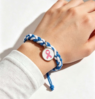 Bracelet rose pour la sensibilisation au cancer du sein en octobre, bracelet tressé à la main avec un ruban rose et un charme rond, bracelet en cordon tissé réglable
