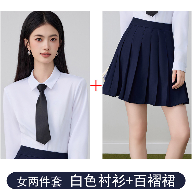 Women's white shirt and blue pleated skirt