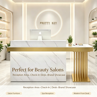 Comptoir de réception en marbre de luxe léger avec cadre métallique doré, comptoir d'accueil moderne pour salon de beauté et spa, OEM