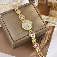 Montre à quartz pour femmes de luxe avec bracelet en or, bijoux colorés et élégants pour femmes, bracelet en acier inoxydable