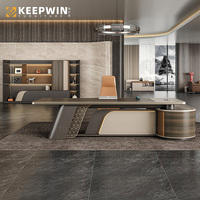 Alibaba Foshan mobilier de bureau usine moderne en forme de L pour patron ordinateur Table de direction en bois