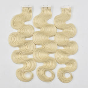 Bombshell 613 Platinum Body Wave Tape-In Hair |   <span class=keywords><strong>Cheveux</strong></span> blonds glacés pour une longueur et un volume ultimes - Product Image 1