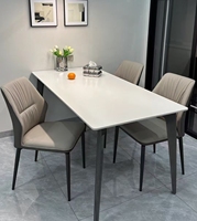 Table de salle à manger blanche en pierre frittée moderne de luxe et 4 6 chaises en cuir PU