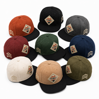 Casquette de baseball à six panneaux texturée avec logo personnalisé et patch brodé pour les marques de streetwear OEM ODM
