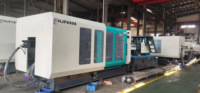 Machine de moulage par injection plastique Machine de fabrication de moules pour casque de moto Ligne de production pour casque de sécurité