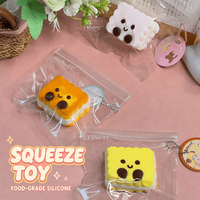 Jouet sensoriel anti-stress en silicone de qualité alimentaire en forme de biscuit sandwich, rembourré de crème, avec visage mignon, souple et compressible, idéal pour la vente en gros