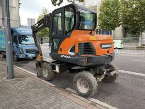 Excavatrice d'occasion 5 tonnes Doosan DX60W Excavatrice à roues Excavatrice d'occasion Doosan DX60W Mini taille Moteur YANMAR 4TNV94L à vendre - Product Image 5