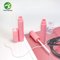 Nouveaux tubes de gloss à lèvres ronds en plastique rose brillant, tubes de correcteur vides, emballage cosmétique en gros OWM/ODM pour marques de maquillage