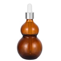 Bouteilles compte-gouttes en verre ambré en forme de gourde, résistantes à la lumière, pour le stockage d'huiles essentielles et l'utilisation cosmétique