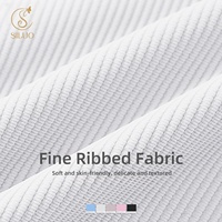 SILUO Ensemble de sport 2 pièces tendance : Haut court blanc à manches longues et col rond, pantalon évasé, survêtement de yoga rayé délavé