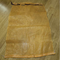 Sacs en maille vides tissés circulaires de la couleur rouge 10 kg de petite taille pour emballer des pommes de terre d'oignons avec le cordon
