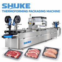 Machine de thermoformage pour l'emballage alimentaire de filets de poisson, de crevettes et de fruits de mer
