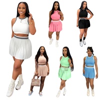Ensemble 2 pièces tricoté décontracté et sportif pour femme : Crop top sans manches et jupe plissée – Collection été 2026