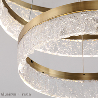 Lampe suspendue longue en cristal moderne de luxe finition or en aluminium et résine LED pour villa et hôtel, lumière blanc chaud, garantie 2 ans