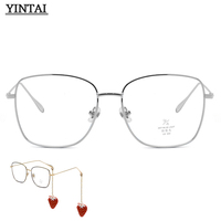Nuevo diseñador de moda decoración colgante marco venta al por mayor Anti luz azul mujeres gafas ópticas marco Metal