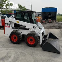 Chargeuse compacte Bobcat S160 d'occasion, mini-chargeuse en bon état de marche pour projets d'aménagement paysager, prête à être expédiée
