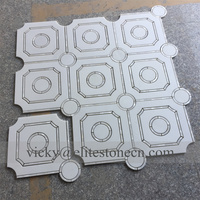 Mosaïque de marbre blanc de Thassos (Grèce) découpée au jet d'eau pour mur d'ambiance intérieur et carrelage de sol