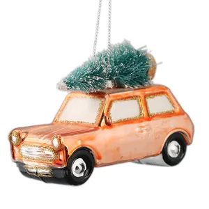 クリスマスの飾りのために運ぶYBオレンジイエローガラス車吊り木