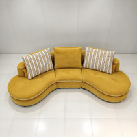 Canapé de salon populaire pour grande villa, ensemble de canapés modernes et élégants en tissu nuage pour usage domestique, nouveau canapé incurvé créatif de designer
