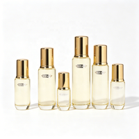 Ensemble de flacons en verre transparent pour cosmétiques avec bouchon doré poli, logo personnalisé pour marque, étiquette privée