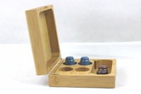Boîte à capsules rectangulaire vide en bambou noir jetable avec logo personnalisé pour le stockage de café de qualité alimentaire
