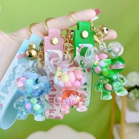 Porte-clés ours lumineux en acrylique et huile dans une bouteille, pendentif de sac, logo personnalisé, porte-clés ours en peluche Bubble Tea