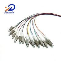 Cable de conversión MPO a LC Simplex de 12 fibras OM3 10G 40G de grado operador con arnés de distribución codificado por colores para concentrador de distribución