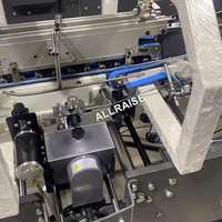 Machine automatique de pliage et de collage de boîtes en carton pour cosmétiques, aliments, et emballages de snacks, avec système de fond à verrouillage automatique et de fermeture par rabat.