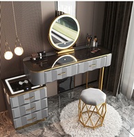 Coiffeuse moderne à succès avec miroir LED éclairé, table de maquillage pour chambre à coucher, charge sans fil, coiffeuse intelligente, vente en gros