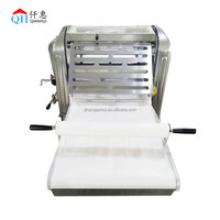 Vente en gros industrie 520 nouvel état acier inoxydable semi-automatique lamineur de pâte support type lamineur de pain pour croissant
