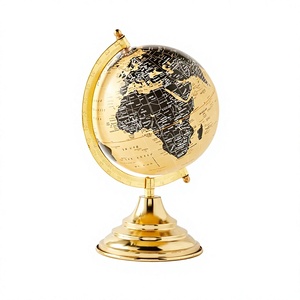 Globo terráqueo metálico dorado con mapa negro y base de latón para equipos de educación geográfica, suministros escolares y de oficina en oferta. - Product Image 1