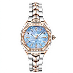 Montre analogique à quartz de luxe pour femme avec cadran bleu, lunette sertie de diamants, bracelet en acier inoxydable et boîtier polygonal - Product Image 1