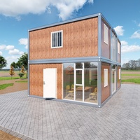 Maison préfabriquée moderne en kit à deux étages avec escalier intérieur, maison conteneur facile à assembler en panneaux sandwich d'acier