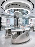 Vitrine de présentation cosmétique GZowin écologique et durable avec éclairage LED, design personnalisable pour la vente au détail et la décoration intérieure