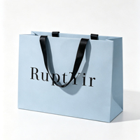 Sacs en papier personnalisés de luxe avec votre propre logo pour vêtements, sacs d'emballage pour boutique de vêtements mats avec poignées en ruban