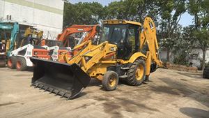 รถตักล้อยาง JCB รุ่น 3CX MUX สีเหลือง มือสอง อุปกรณ์ก่อสร้าง น้ำหนักบรรทุก 7 ตัน เครื่องยนต์คัมมินส์สำหรับปั๊มไฮดรอลิก กำลัง 75 กิโลวัตต์ - Product Image 5
