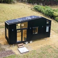 Casa flotante con paneles solares Alimentado por energía solar 20 pies 40 pies Contenedor de acero Casa Panel sándwich Paquete plano Diseño de contenedor
