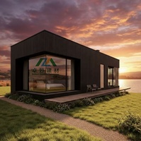 Maison préfabriquée contemporaine en acier et bois à montage facile avec énergie solaire, conception étanche, pour jardin arrière, usage hôtelier de luxe