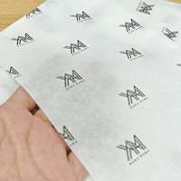 Papier cadeau en papier de soie enduit biodégradable écologique personnalisé avec logo de l'entreprise pour l'emballage des vêtements