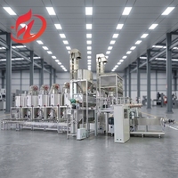 Ligne de production d'aliments pour chiens/chats/poissons de 1000 kg/h, équipement d'extrusion de nourriture sèche pour chiens motorisé contrôlé par PLC à vendre