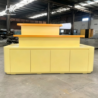 Meuble de présentation lumineux à LED personnalisable, écologique, durable et de haute qualité, avec étagères arrondies jaunes et oranges à niveaux