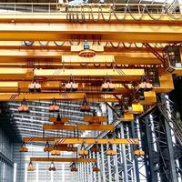Pont roulant magnétique industriel de 20 tonnes de qualité européenne avec élévateur électromagnétique pour la manutention de matériaux lourds en acier en entrepôt